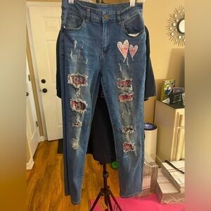 Jeans Wear perfectly distressed and appliquéd jeans  mid-blue with fading. Sz 5